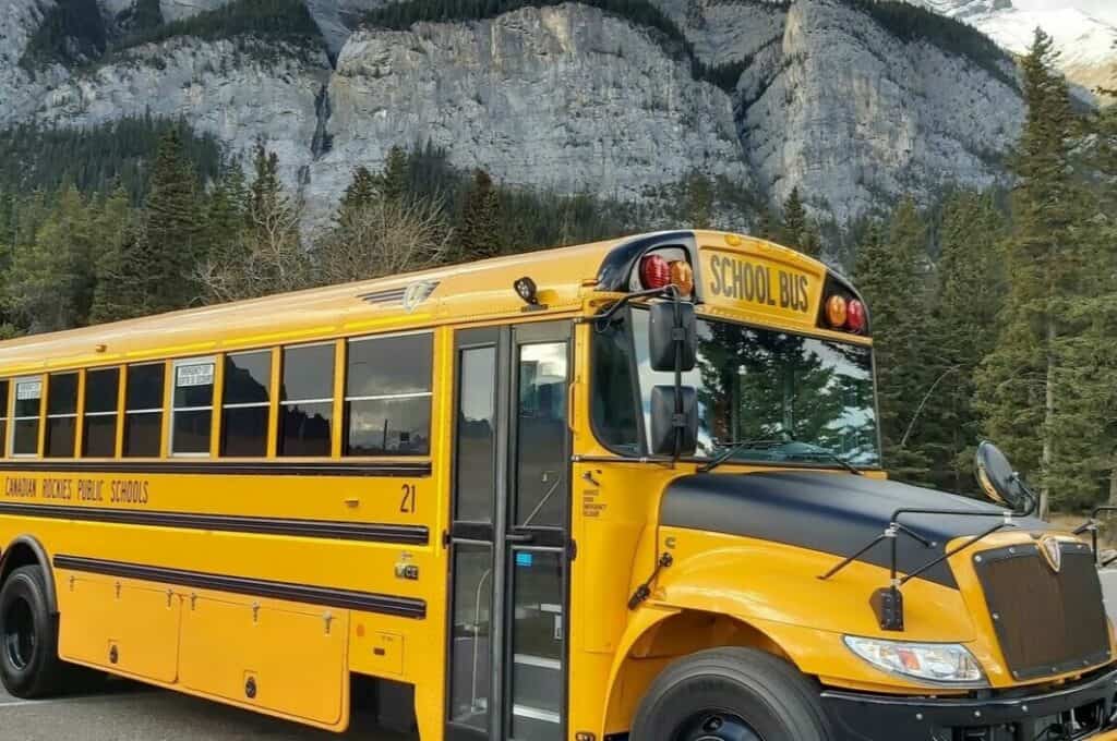 Canmore rockies public schools bright yellow bus for one of the canmore schools