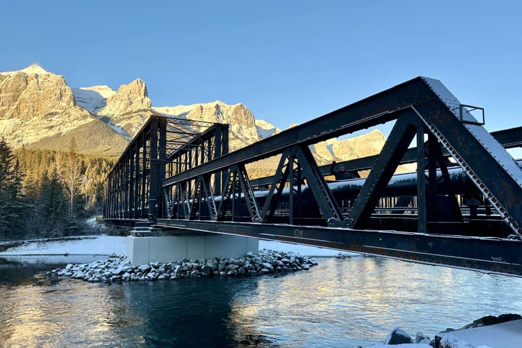 The iconic canmore engine bridge in winter on the bow river loop trail canmore alberta
