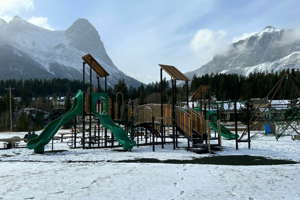 A playground in the snow one of the things to do in canmore with kids in winter